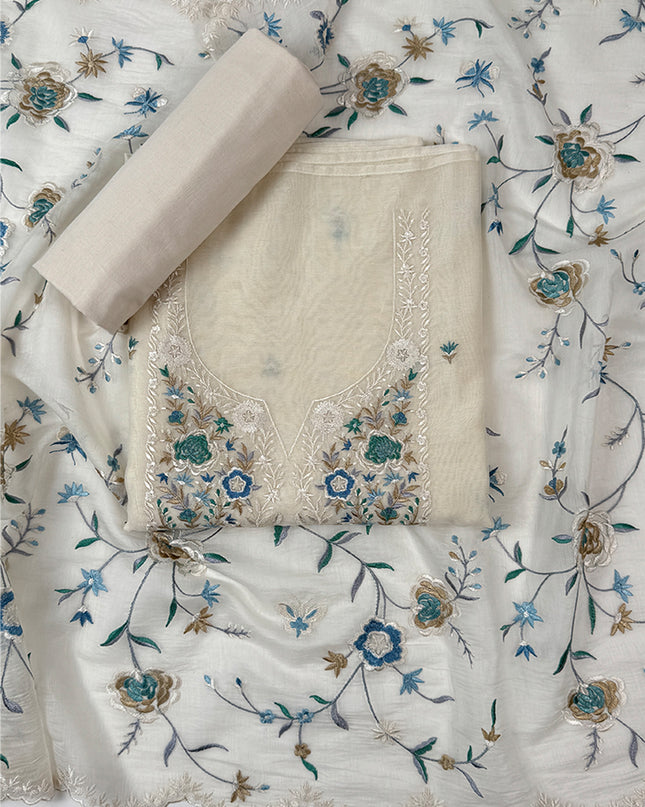 Coastal cream Suit set in malmal fabric with parsi work