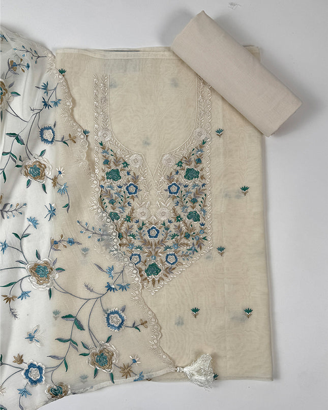 Coastal cream Suit set in malmal fabric with parsi work