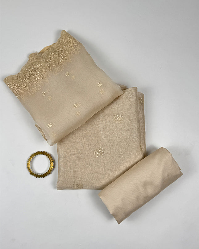 Sunehri shade Suit Set in tissue linen fabric with thread work