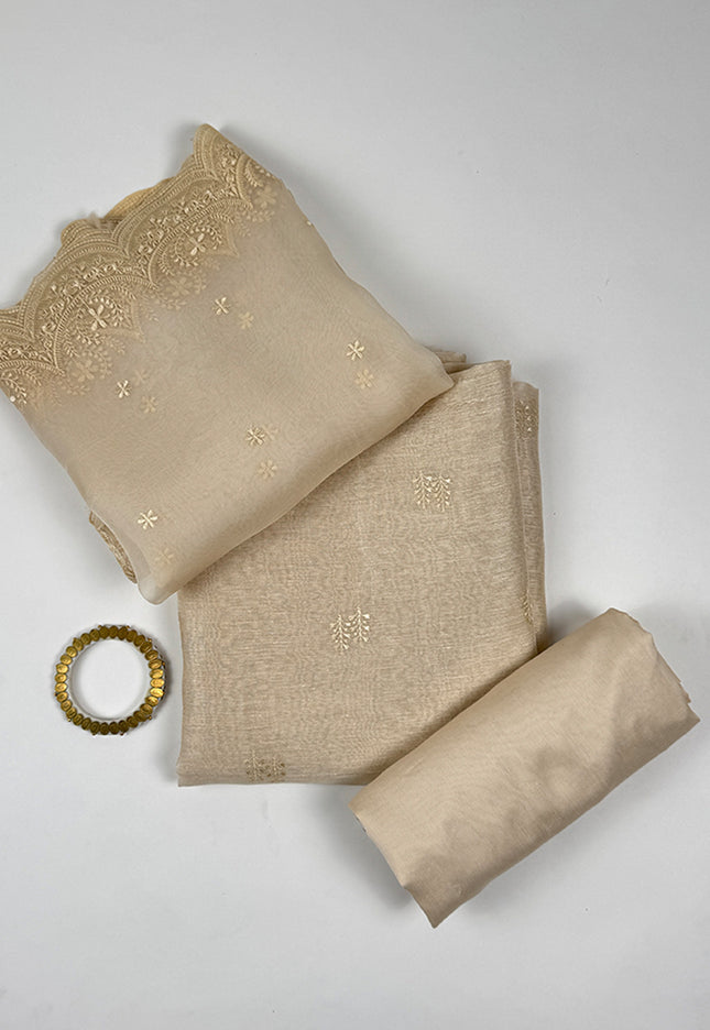 Sunehri shade Suit Set in tissue linen fabric with thread work