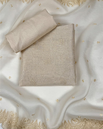 Sunehri shade Suit Set in tissue linen fabric with thread work