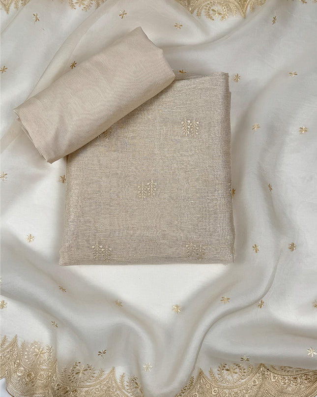 Sunehri shade Suit Set in tissue linen fabric with thread work