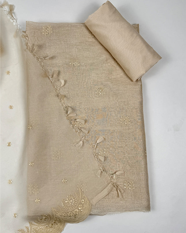 Sunehri shade Suit Set in tissue linen fabric with thread work